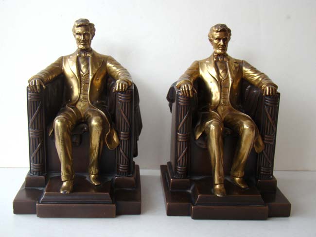 A fine pair of "Lincoln in the chair" antique bookends by Jennings Brothers circa 1930